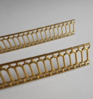 Moldura de latón
